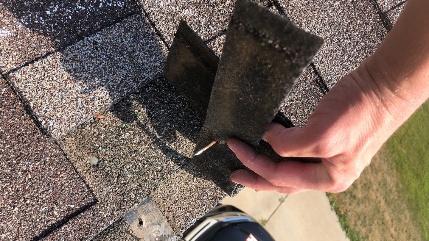B-before Before roof condition showing worn shingles and damage prior to roofing replacement by Wegner Roofing